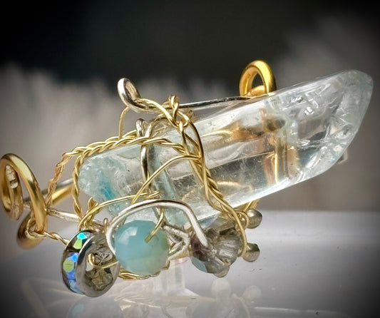 Blue quartz crystal ring a radiated 
