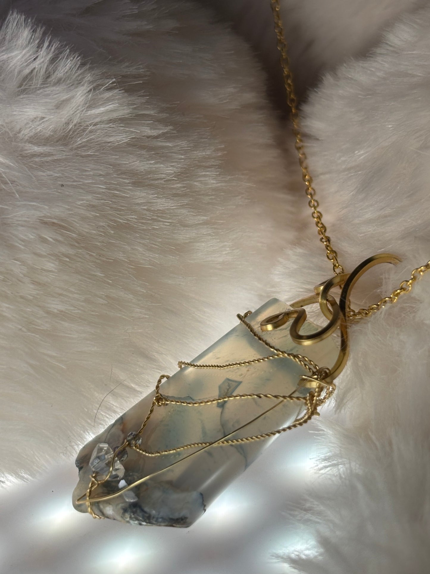 Sacred Shield of Madagascar Collection:

Guardian of the Blue- Rare Sea Agate pendant from Madagascar