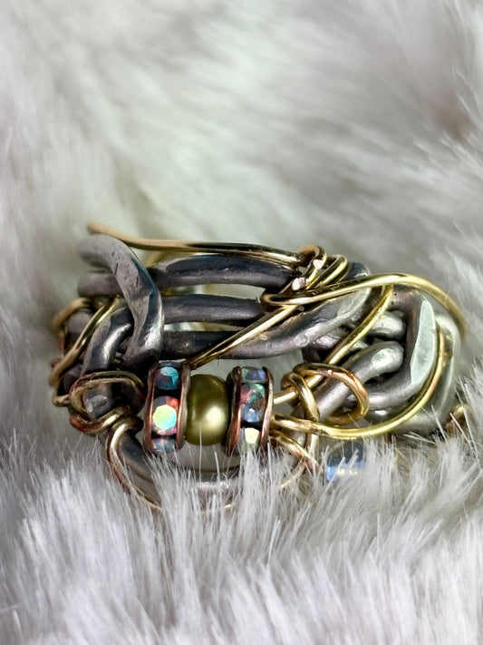 See pearl and silver ring: ￼ CALM, AND CHAOS ￼