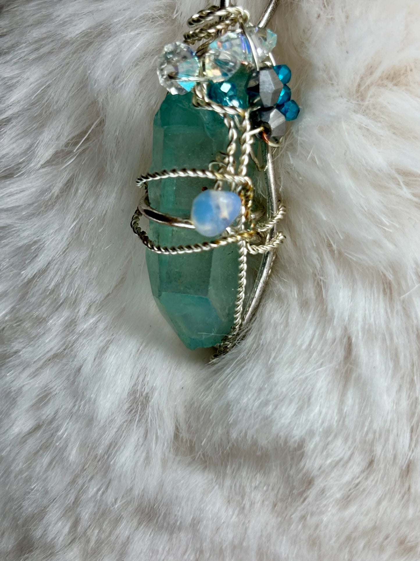 Hidden Prism, Rainbow Magic: green radiated crystal pendant